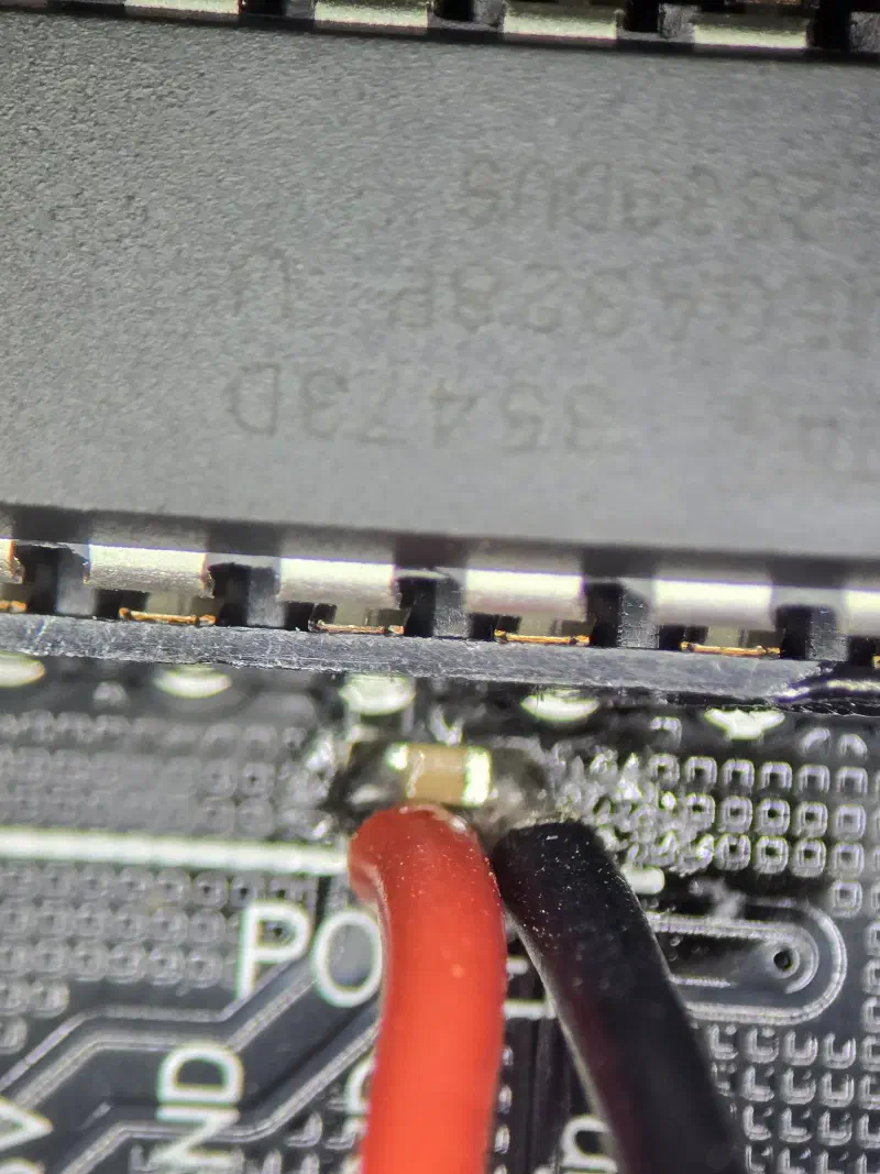 Wires soldered to the target, close up